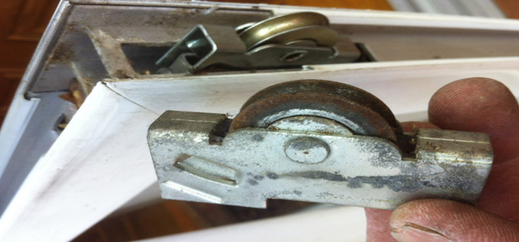 screen door roller repair in Home Gardens